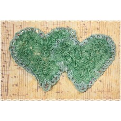 Double heart-shaped green patch with satin and sequin decoration