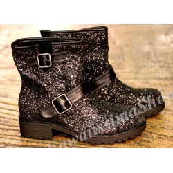 Sparkling black biker boots , beautiful woman shoes